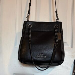 Coach, leather bucket bag with gun metal hardware extra Crossbody strap!